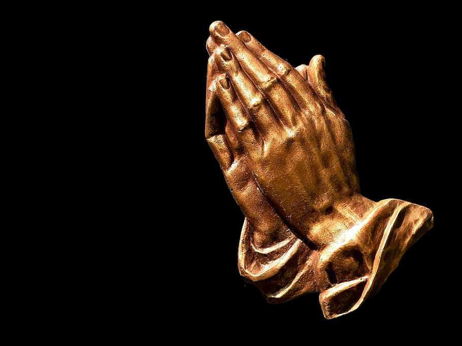 closeup, brass-colored, praying,.jpg